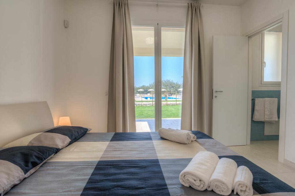 Il Giardino Dei Frangipani Apartment ซานตาโกรเชกาเมรีนา ภายนอก รูปภาพ