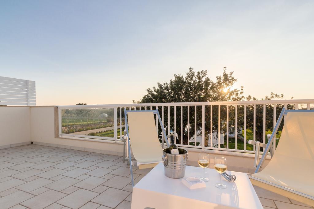 Il Giardino Dei Frangipani Apartment ซานตาโกรเชกาเมรีนา ภายนอก รูปภาพ