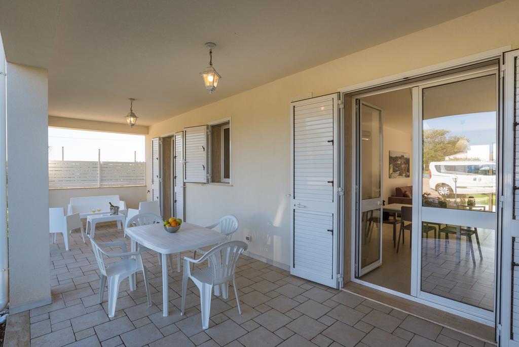 Il Giardino Dei Frangipani Apartment ซานตาโกรเชกาเมรีนา ภายนอก รูปภาพ