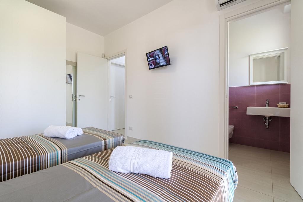 Il Giardino Dei Frangipani Apartment ซานตาโกรเชกาเมรีนา ภายนอก รูปภาพ