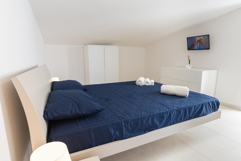 Il Giardino Dei Frangipani Apartment ซานตาโกรเชกาเมรีนา ภายนอก รูปภาพ