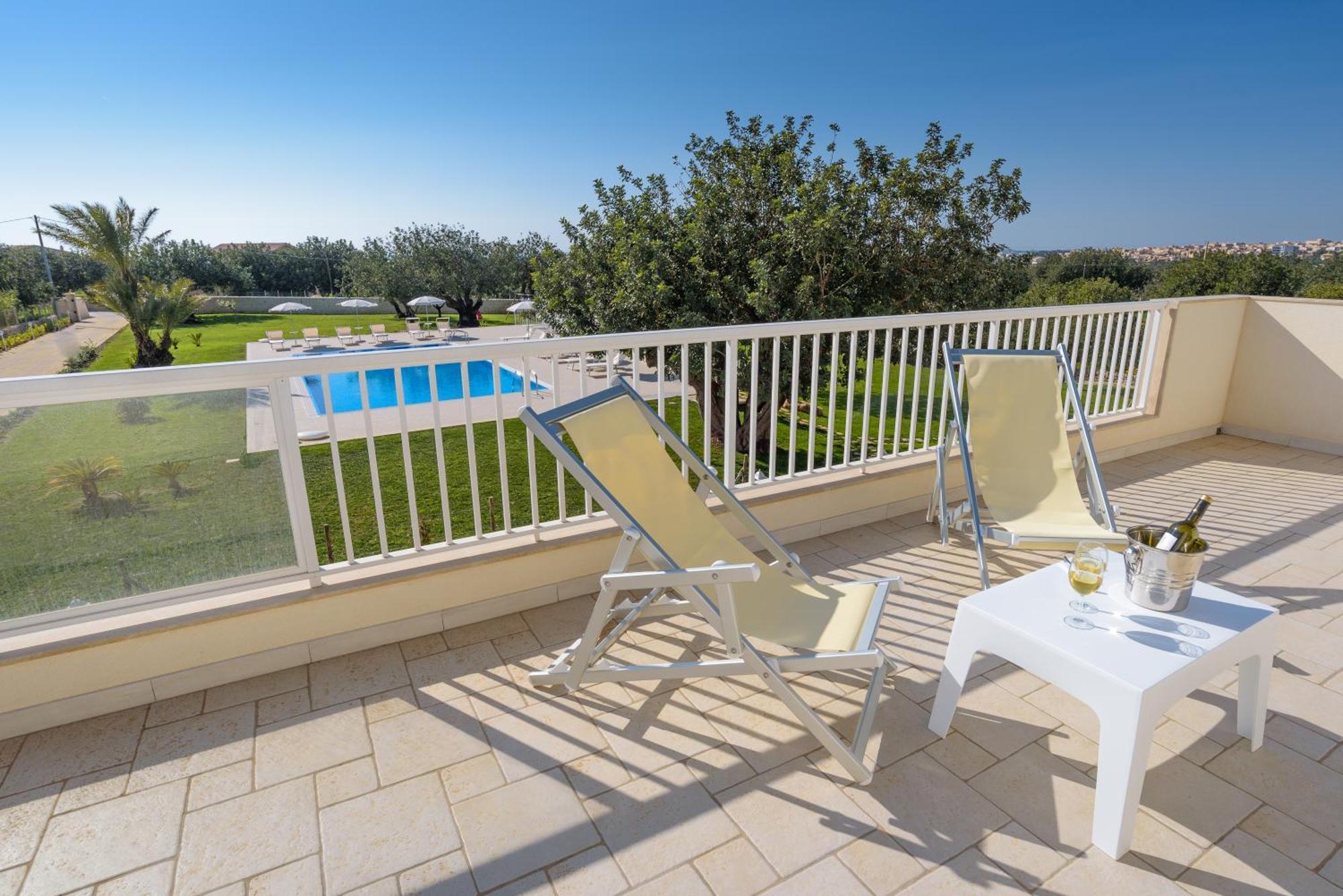 Il Giardino Dei Frangipani Apartment ซานตาโกรเชกาเมรีนา ภายนอก รูปภาพ