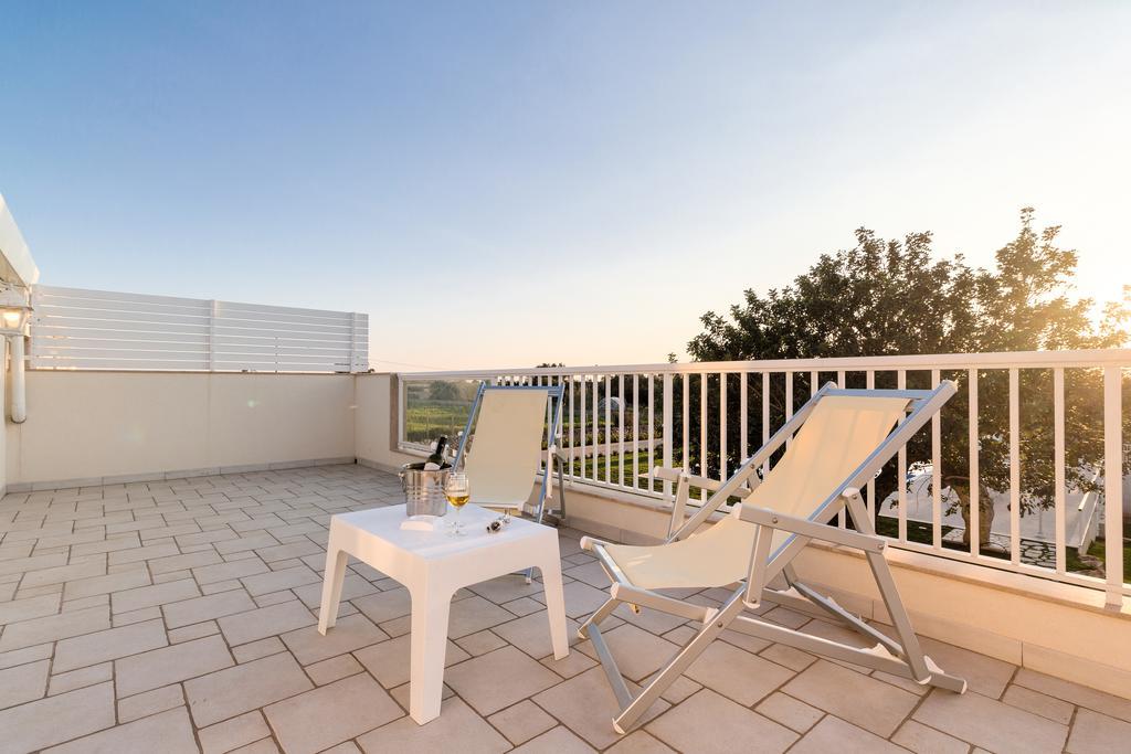 Il Giardino Dei Frangipani Apartment ซานตาโกรเชกาเมรีนา ภายนอก รูปภาพ