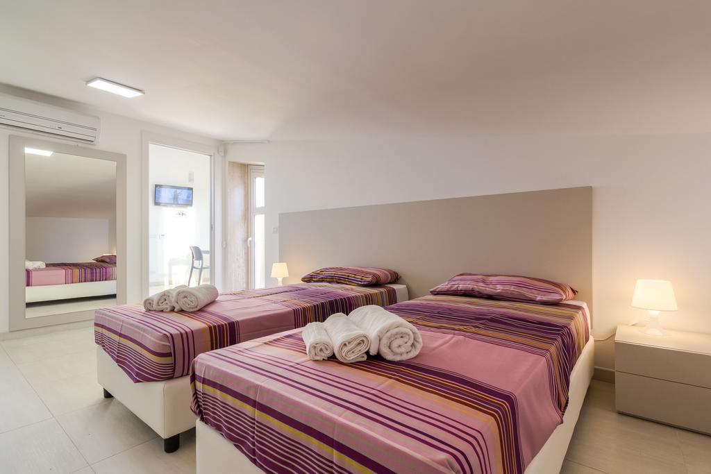 Il Giardino Dei Frangipani Apartment ซานตาโกรเชกาเมรีนา ภายนอก รูปภาพ