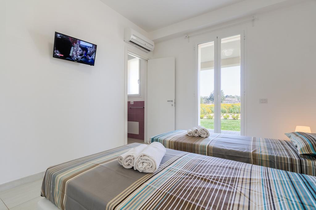 Il Giardino Dei Frangipani Apartment ซานตาโกรเชกาเมรีนา ภายนอก รูปภาพ